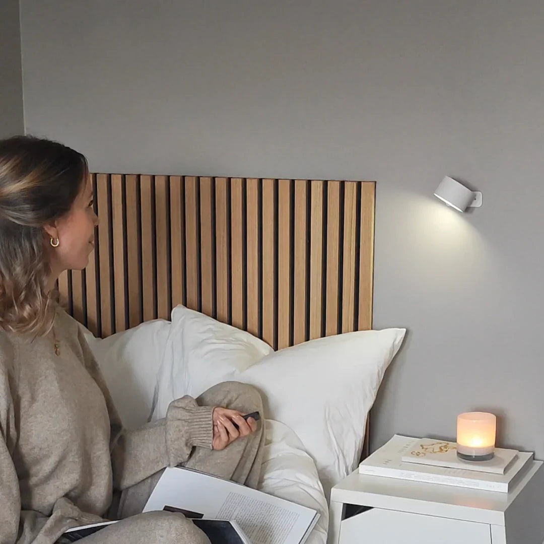 Compact cordless wall lamp used in a modern interior